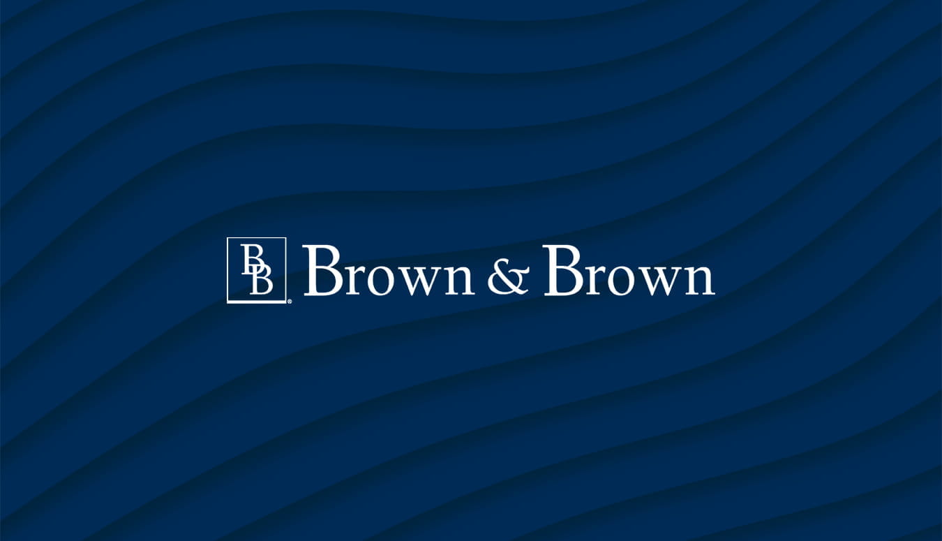Brown & Brown logo: Two overlapping white Bs in a dark square next to the company name in bold dark type on a white background. Brown & Brown provides insurance and risk management solutions for real estate investors.